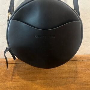Portland Leather Circle Crossbody in smooth black leather. Very Good Condition.